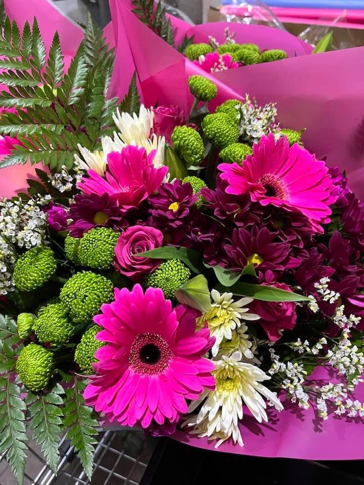 Bright pink gerbera and green chrysanthemum bouquet
