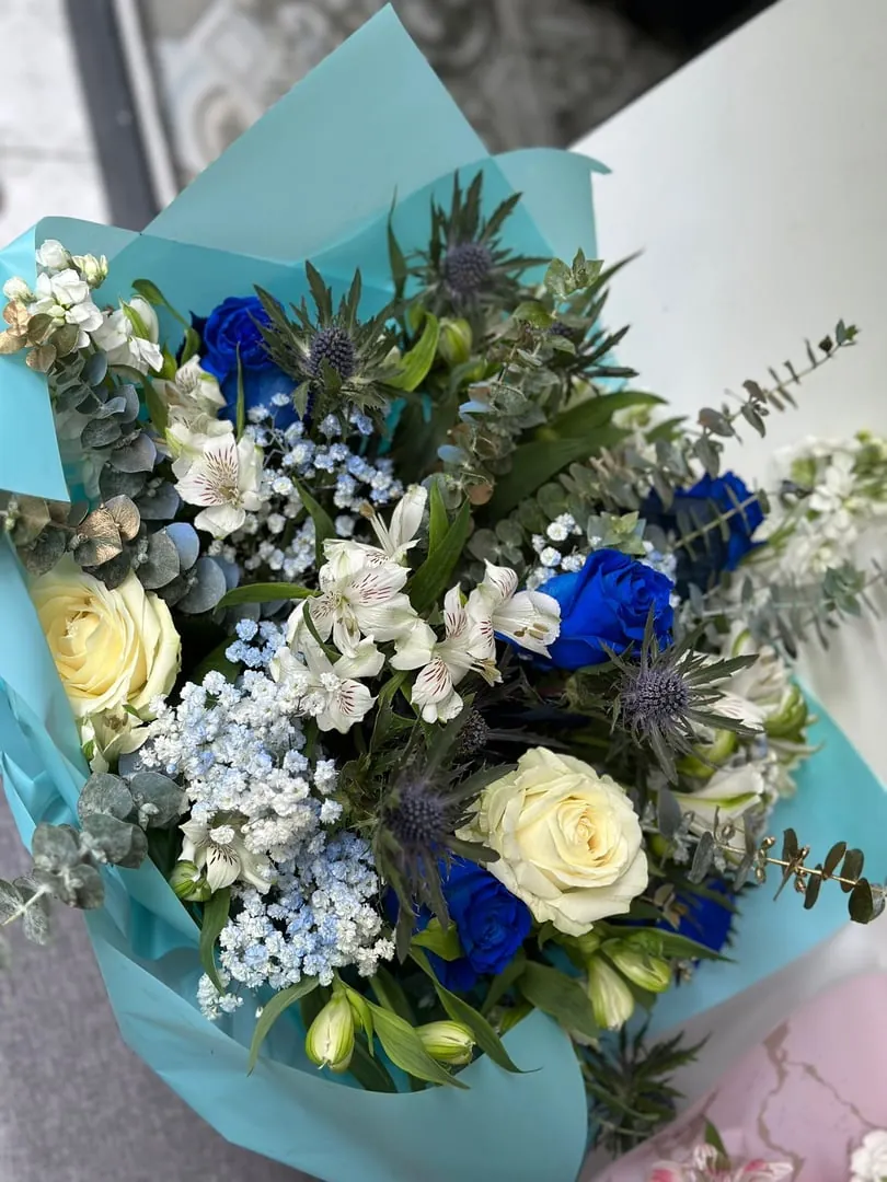 Blue and white sympathy bouquet