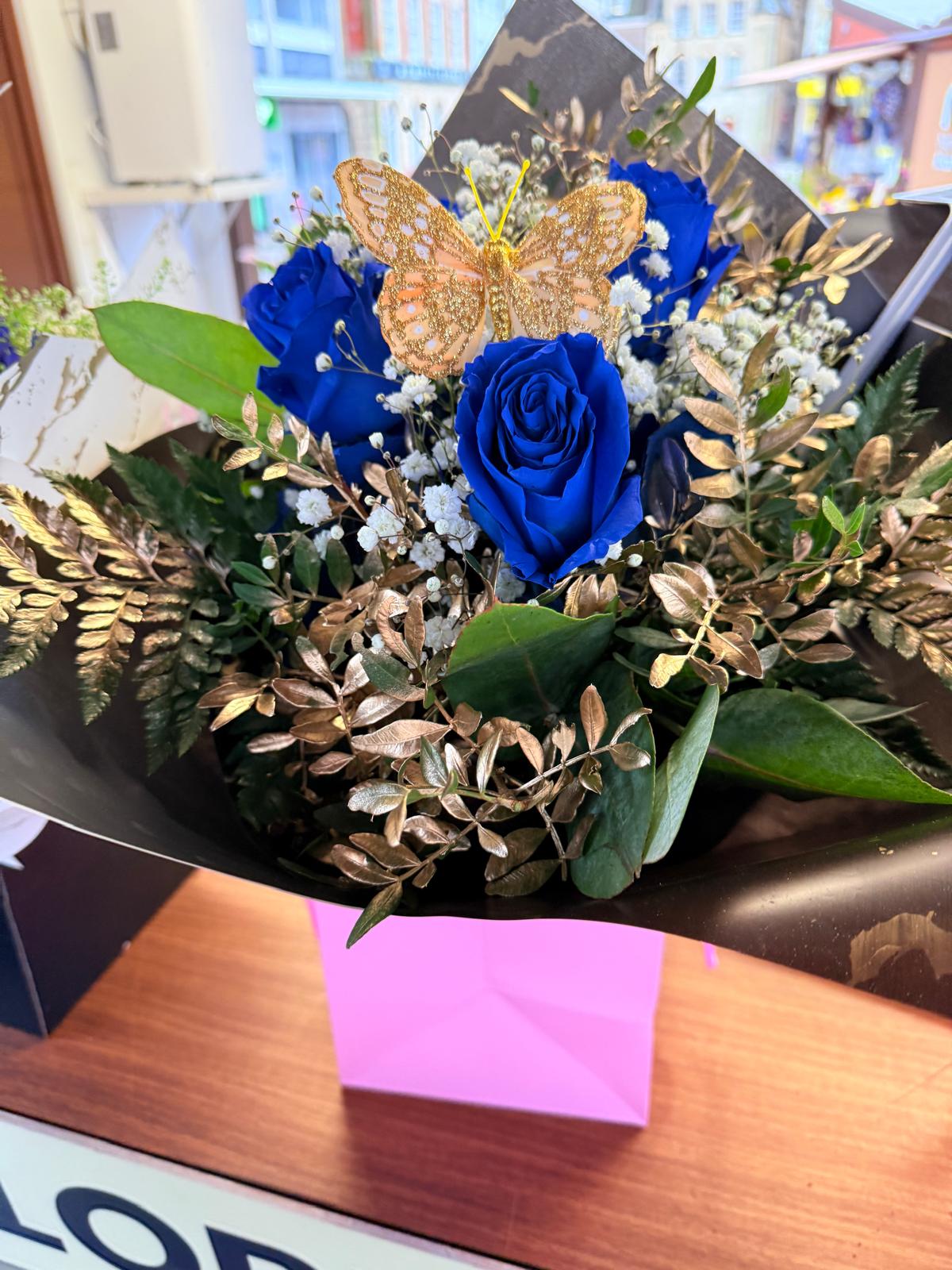 Blue roses with gold leaves