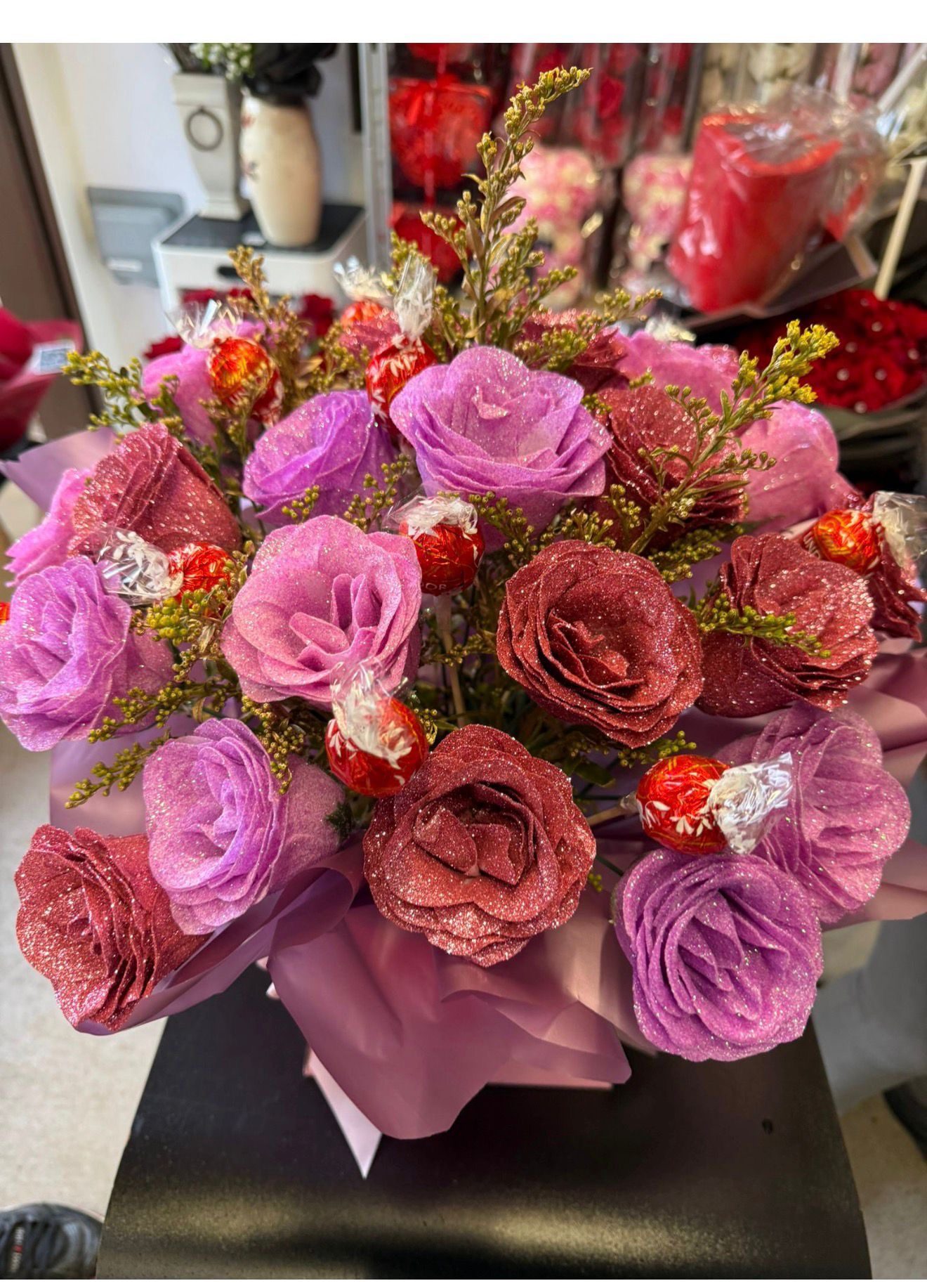 Pink and purple roses with Lindor chocolates