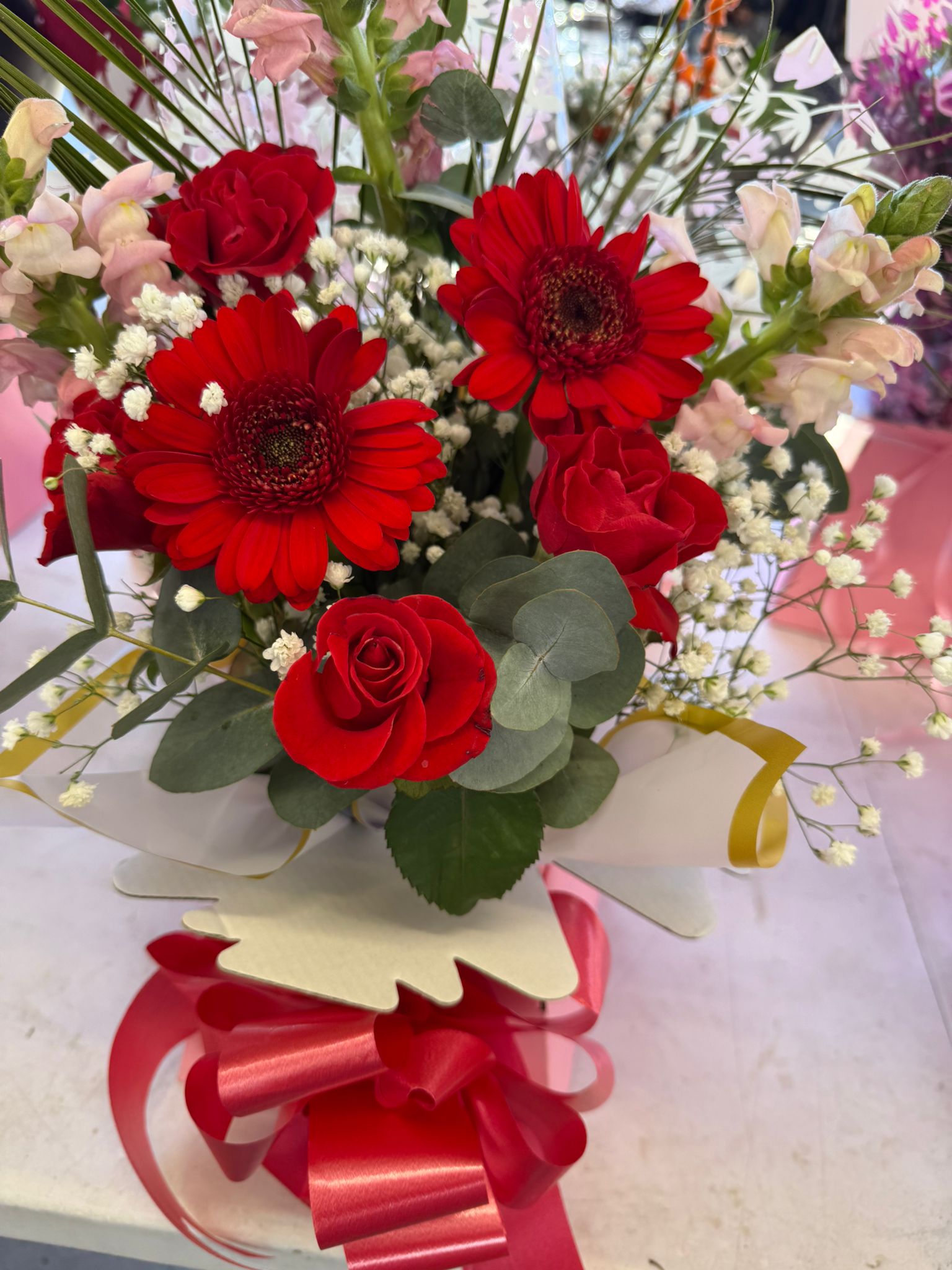 Red gerbera and rose mini arrangement