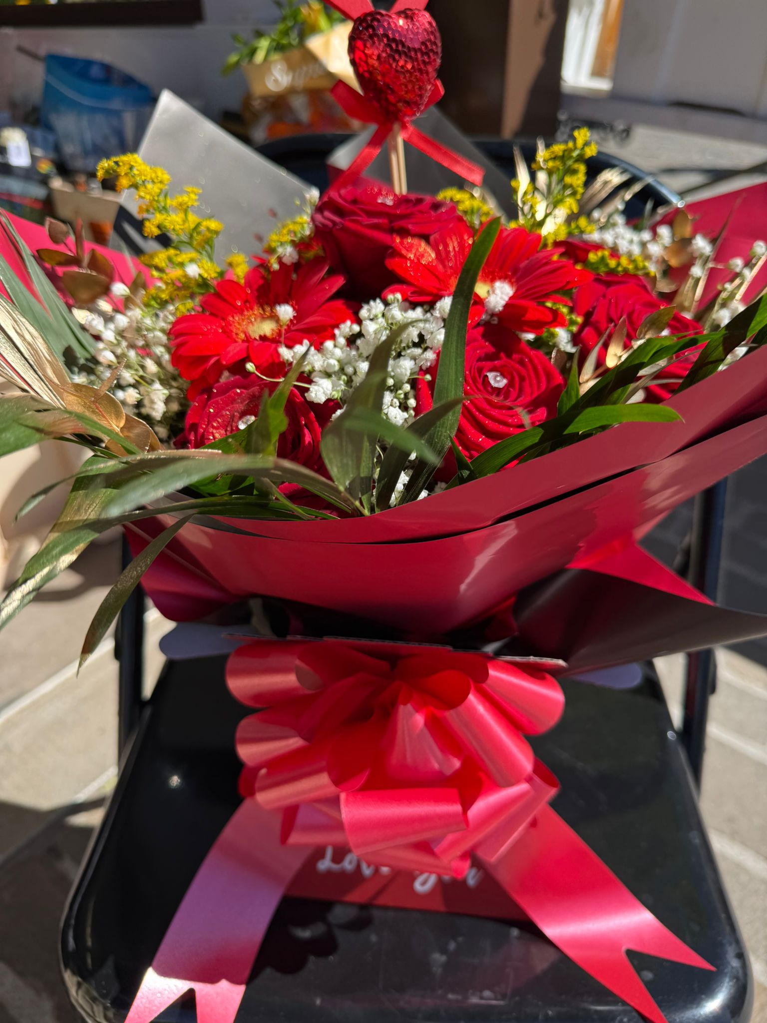 Red roses with strawberry pick