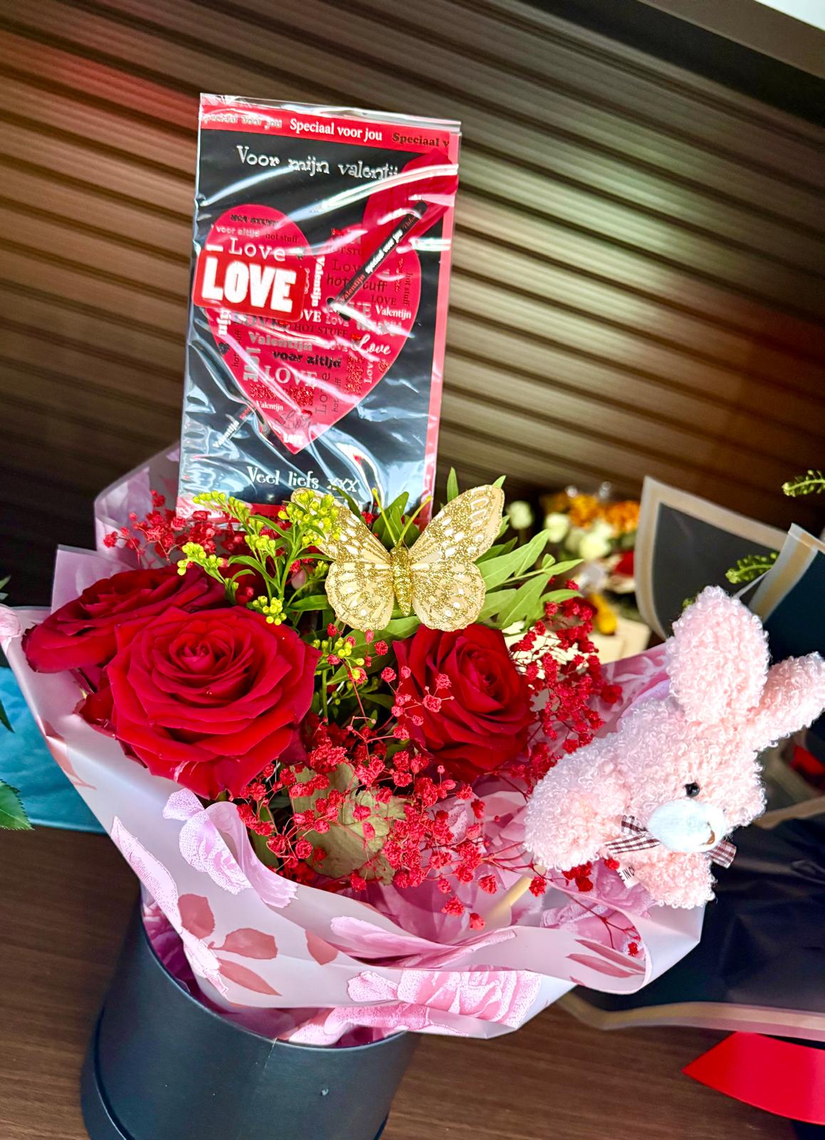 Red roses with bunny and Ferrero